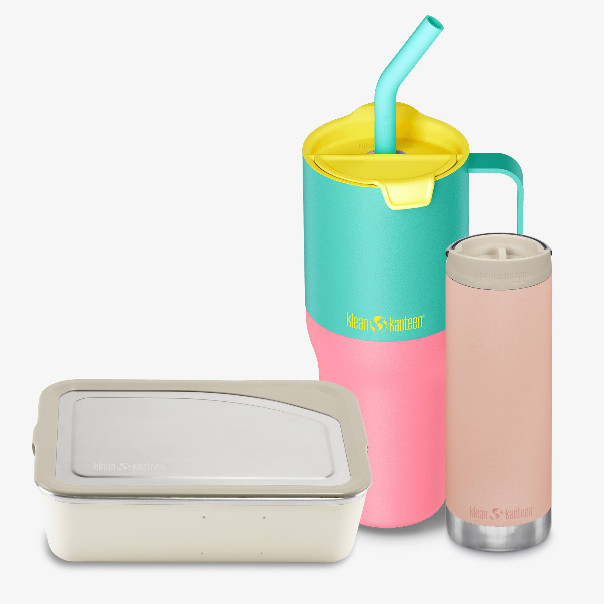 Set of colorful insulated tumblers and a container on a white background