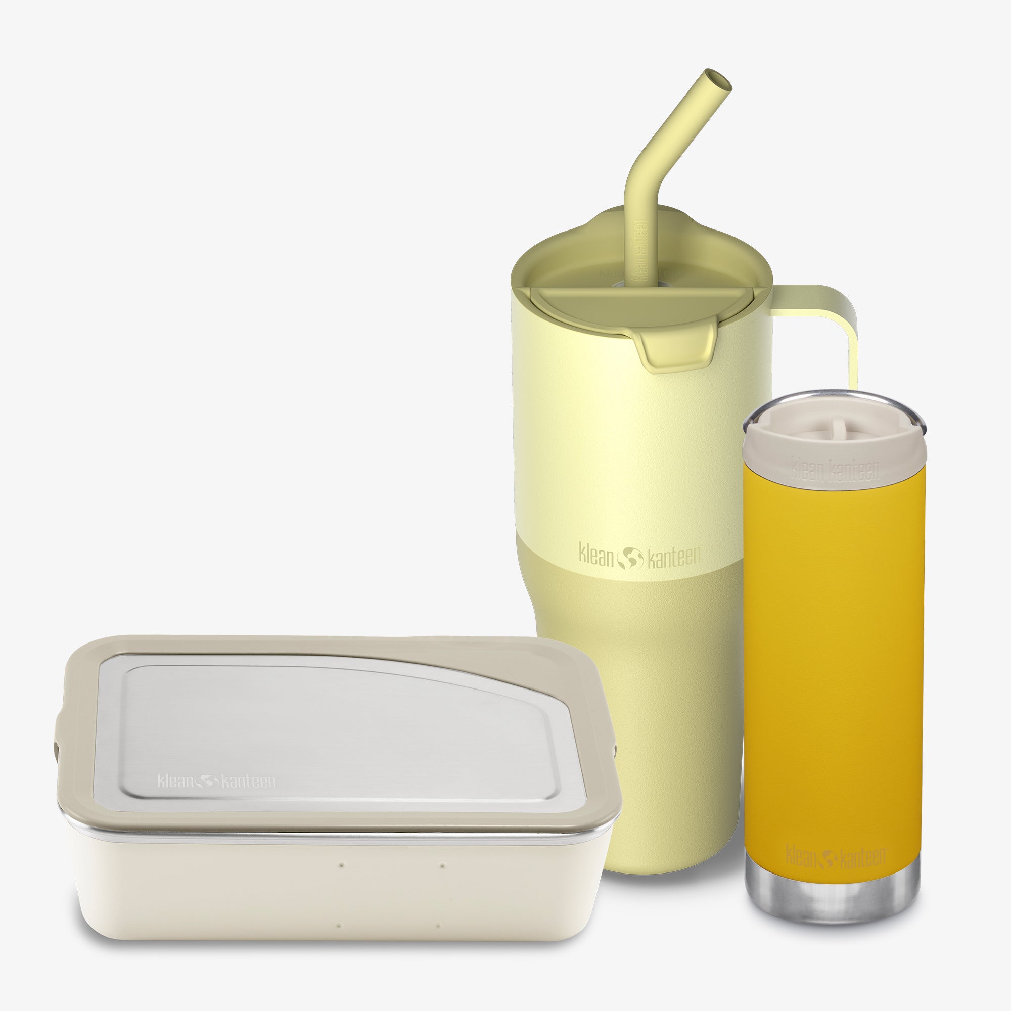Set of yellow insulated tumbler with straw, glass, and container on a white background