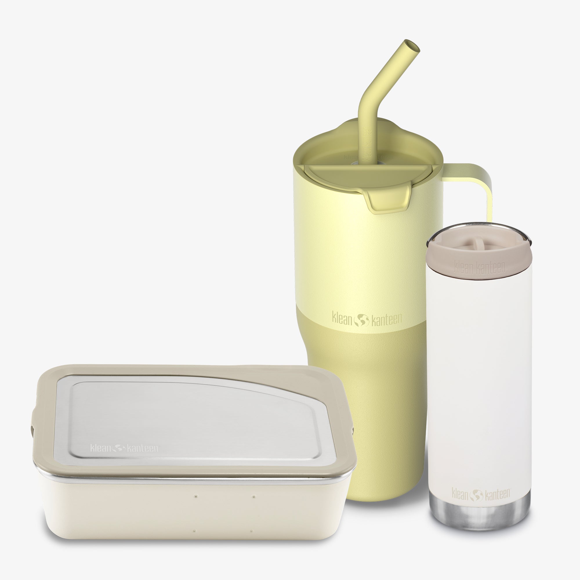 Set of reusable containers with a yellow tumbler and clear bottle on a white background