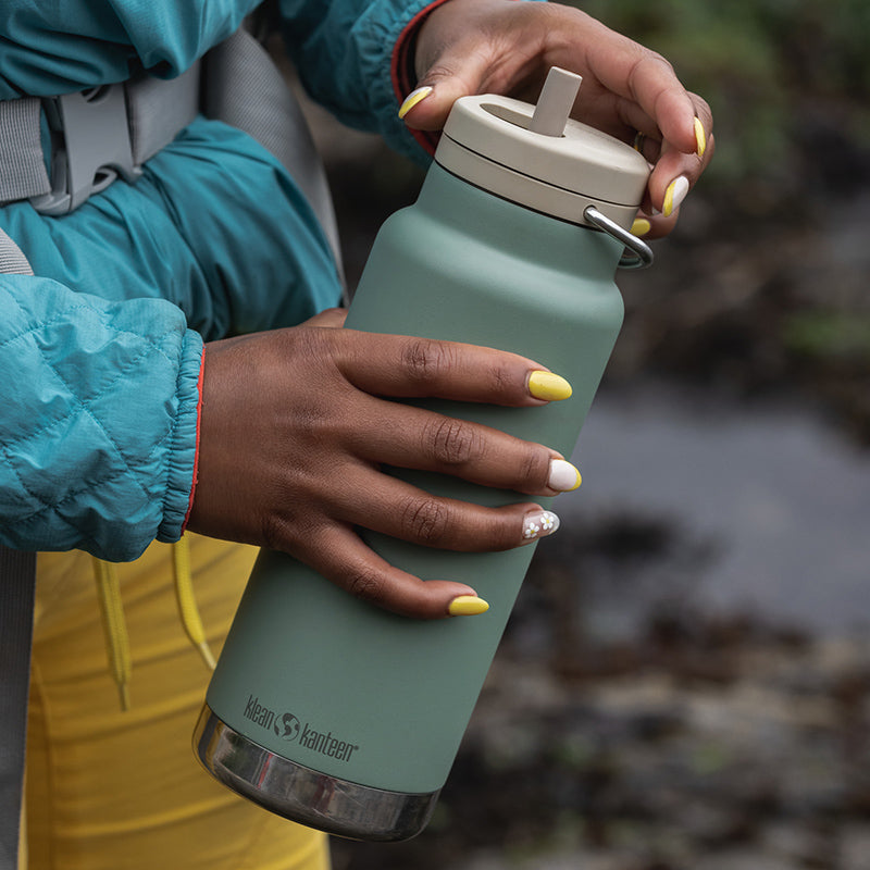 Close up of water bottle with straw cap
