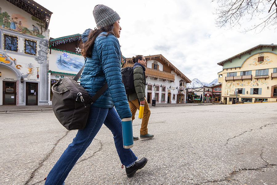 Coupling walking with coffee tumblers in Europe