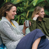 Woman with  10 ounce steel cup for cocktails